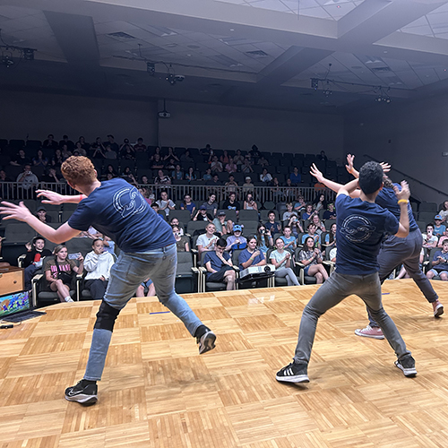 Youth performing on stage at the talent show